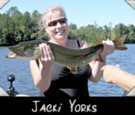 Jacki Yorks with 34 1/5 inch musky guided by Tim Cerny