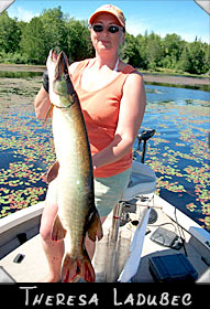 Theresa Ladubec with 37 1/4-inch musky guided by Glen Moberg