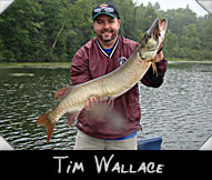 Tim Wallace with his 41-inch musky guided by Ron Rickman